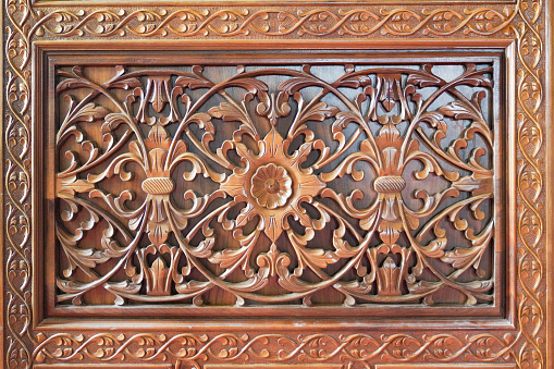Details of a fine wood carving art on the door, an Islamic art and craft.