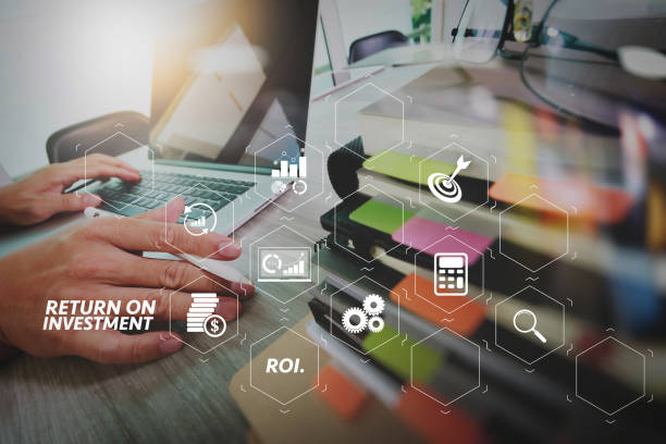 istock business documents on office table with smart phone and digital tablet and graph business with social network diagram and man working in the background 1003163500