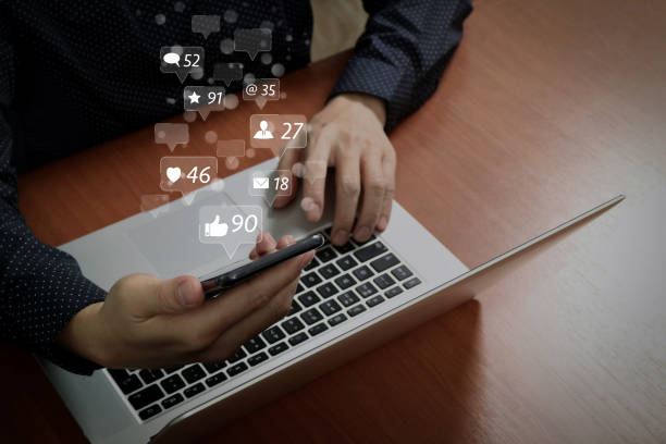istock top view,business man hand using smart phone,laptop, online banking payment communication network technology 4.0,internet wireless application development sync app 1003165910