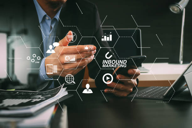 istock businessman working with smart phone and digital tablet and laptop computer in modern office 1003174952