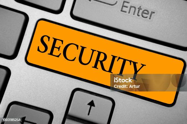 Text Sign Showing Security Conceptual Photo The State Of Feeling Safe Stable And Free From Fear Or Danger Keyboard Orange Key Intention Create Computer Computing Reflection Document Stock Photo - Download Image Now