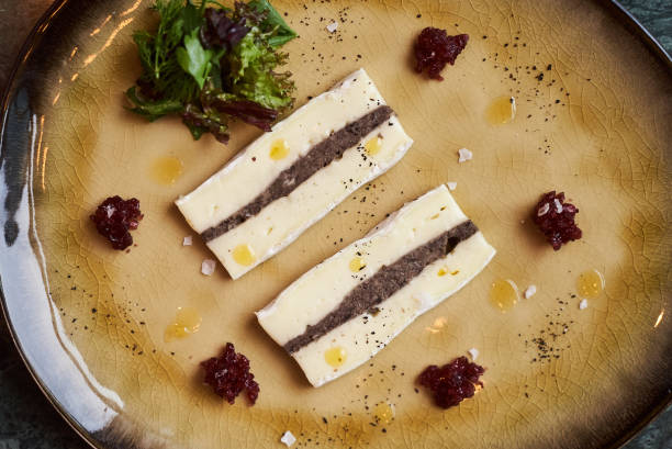 istock Brie cheese with truffle and jelly barberry 1003185710