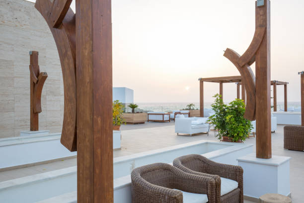 istock Sunset in cafe bar in sea hotel resort 1003186292