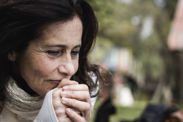istock Middle aged lady with pessimistic look 1003188660