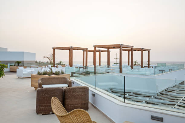 istock Sunset in cafe bar in sea hotel resort 1003192436