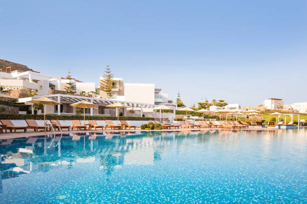 istock Hotel swimming pool, outdoor, with sunbeds around 1003203964
