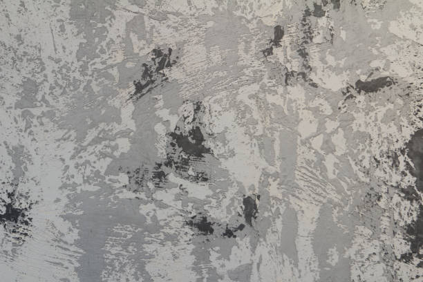 istock black and white cement wall concrete background stucco. 1003206252
