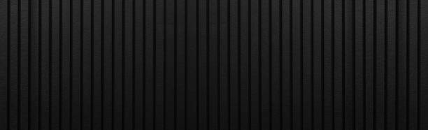 istock Black wood fence pattern and seamless background 1003206514