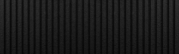 istock Black wood fence pattern and seamless background 1003209608