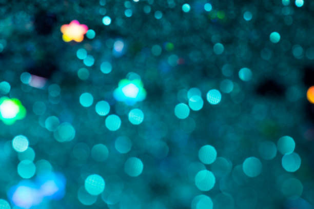 istock Colorful glitter abstract background with bokeh 1003210242
