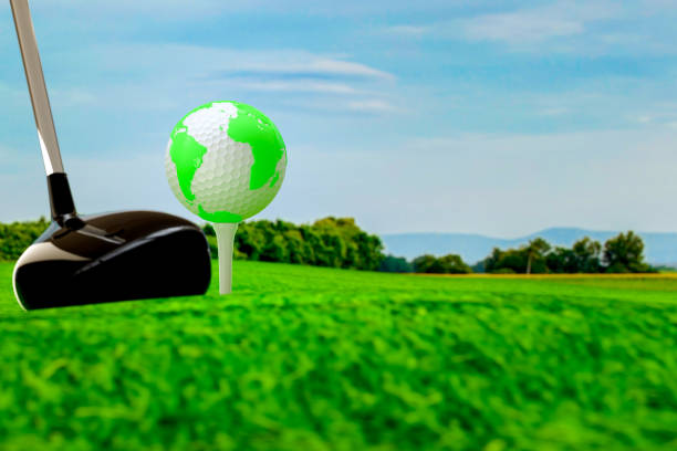 istock Globe on golf ball on green grass. 1003215786