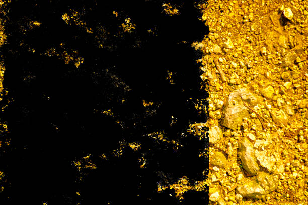 istock Grunge Ultra yellow Ground like on Mars, land texture, sand surface, stone background 1003221216