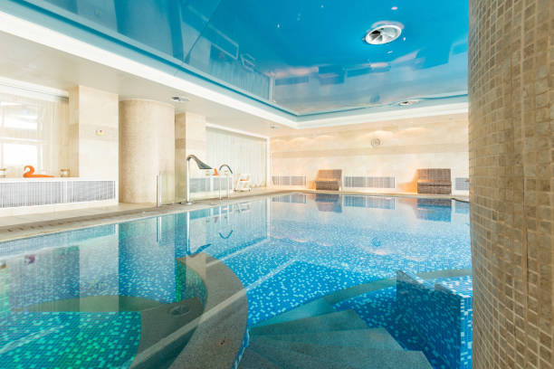 istock Indoor swimming pool in hotel spa center 1003224554