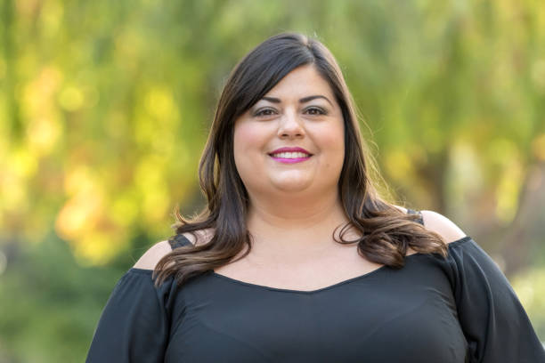 istock Smiling mid adult woman 1003225368