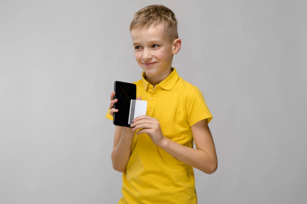 istock Cute boy with telephone 1003234738