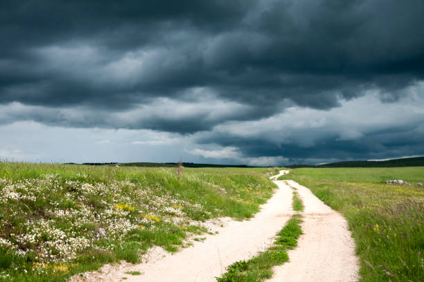 istock Stormy sky in countryside 1003239322