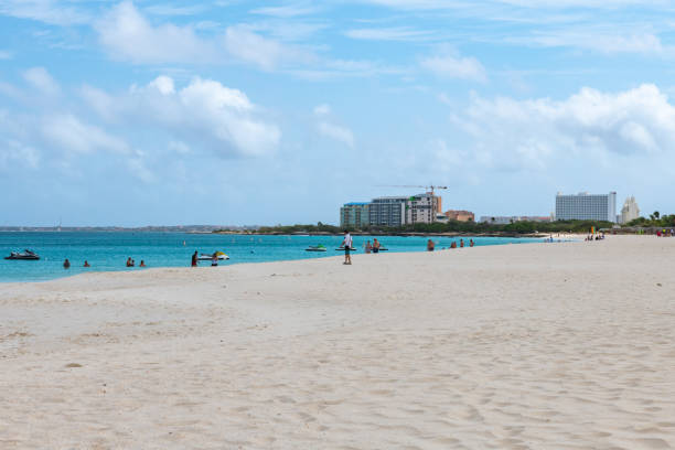 istock Aruba, Eagle Beach, April 21, 2018, View of Eagle Beach and high rise hotels 1003246634