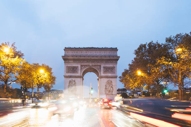 istock Arc de Triumph with traffic lights in rain 1003256946