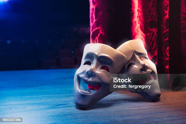 Theater Masks In Front Of A Red Curtain 3d Rendering Stock Photo - Download Image Now
