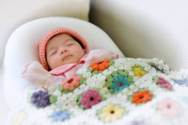 istock Sleeping cozy baby girl 1003259894