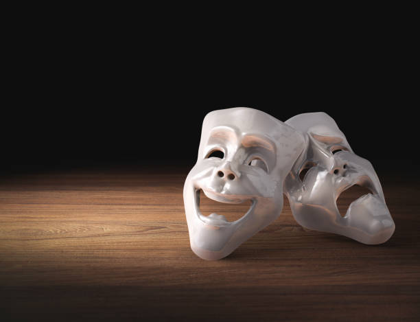 istock Theater masks on a dark background/ 3D rendering 1003260112