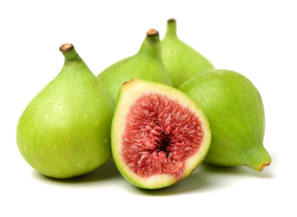 istock Bisected and whole fig fruit isolated on white 1003266392