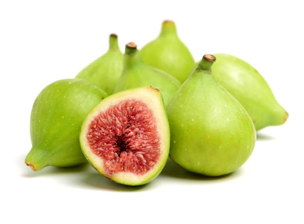istock Bisected and whole fig fruit isolated on white 1003266468