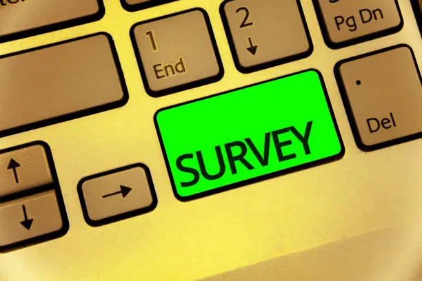 Photo of Text sign showing Survey. Conceptual photo Questioning group of people to gather opinion on a particular subject Keyboard key laptop creative computer brown keypad idea notebook netbook.
