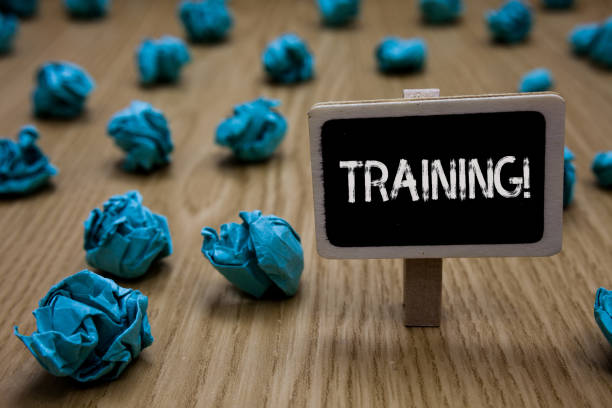 istock Writing note showing Training Motivational Call. Business photo showcasing Organized activity to develop skill set of people Cyan paper imagination idea crumpled papers mistakes several tries. 1003272710