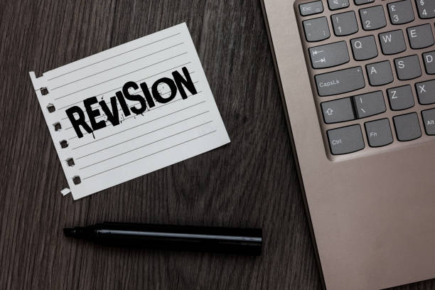 istock Word writing text Revision. Business concept for Rechecking Before Proceeding Self Improvement Preparation Laptop nice computer notebook netbook pen small pitch paper pen wood. 1003273020