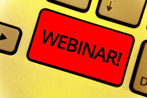 istock Word writing text Webinar Motivational Call. Business concept for Internet distance learning web elearning Keyboard key Intention create idea yellow computer brown keypad notebook. 1003275728