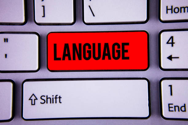 istock Conceptual hand writing showing Language. Business photo text Method of human communication Spoken Written Use Words Expression Keyboard office typing work click assign button computer program. 1003275870
