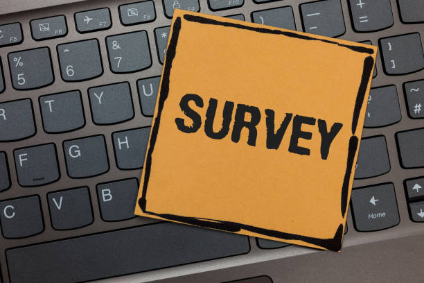 istock Handwriting text writing Survey. Concept meaning Questioning group of people to gather opinion on a particular subject Black laptop keyboard art paper computer notebook netbook keypad key. 1003275948