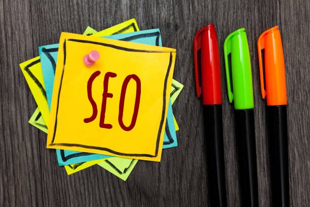 istock Text sign showing Seo. Conceptual photo Search engine optimization increase in online marketing channel Three marker pens four small art papers important informative memories. 1003278716