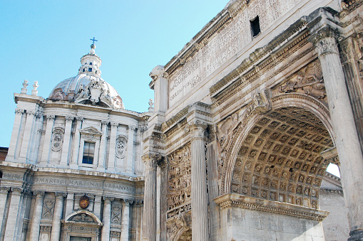 Closeup of old Roman Architecture at the Rpman Forum in Rome, Italy, including the Arch of Septimius Severus.