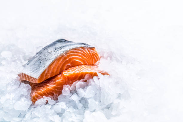 istock Close-up Fresh raw salmon fillets on Ice. 1003304066