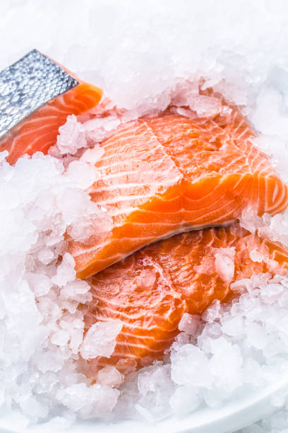 istock Close-up Fresh raw salmon fillets on Ice. 1003304070