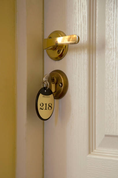 istock Lock with key from hotel room 218 1003312320