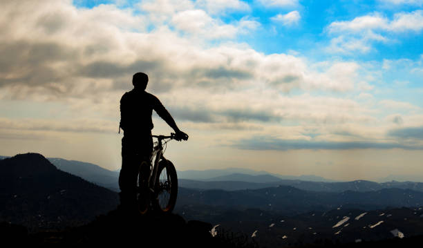 istock bicycle and mountain success story 1003321728