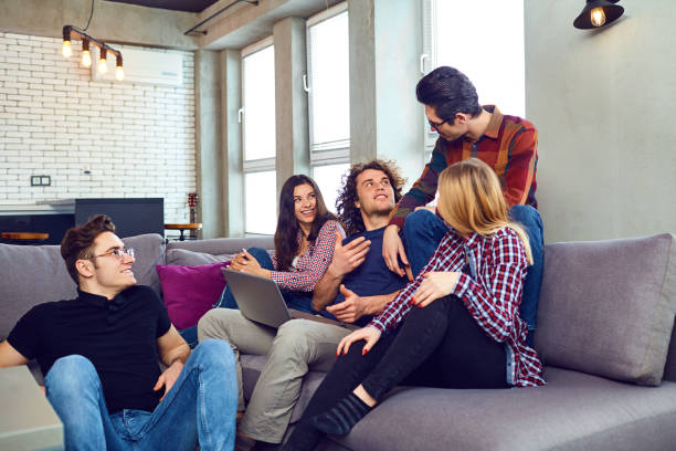 istock A group of young people have fun chatting at a meeting 1003321978