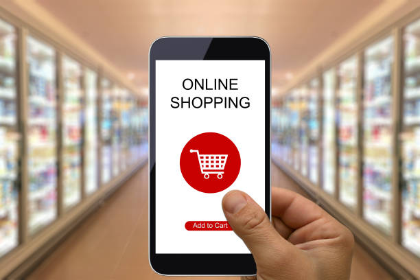 istock E-commerce internet shopping cart mobile phone app supermarket 1003328648