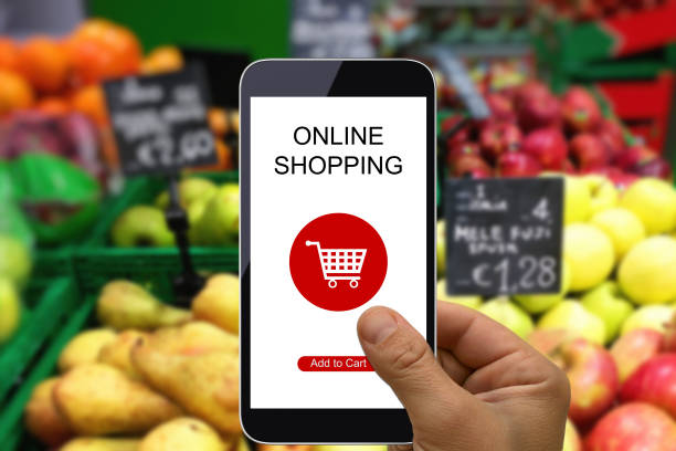 istock E-commerce internet shopping cart mobile phone app supermarket 1003328658