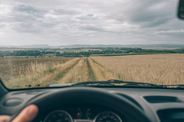 istock Off road car on journey. Drivers perspective. 1003338804