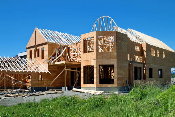 istock Construction of a new wooden house 1003339402