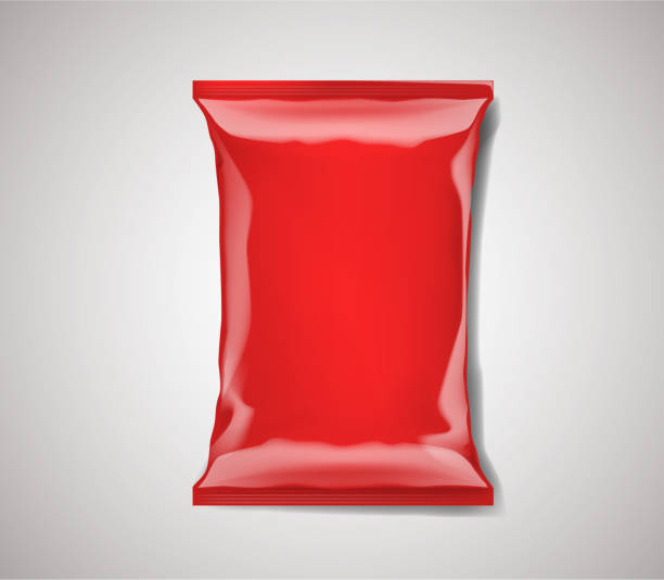 istock Red blank foil plastic bag packaging isolated. Mock-up design template for branding for chips, snack, cookies, peanuts. 1003351698