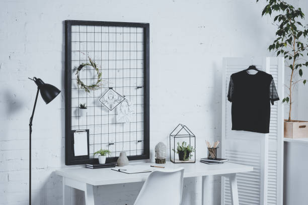 istock working office table with office supplies and plants 1003365346