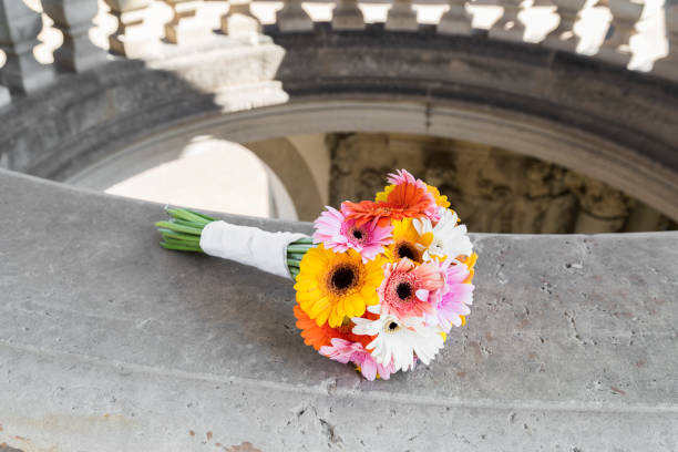 istock Bouquet of chrysanthemums lying on stone 1003383650