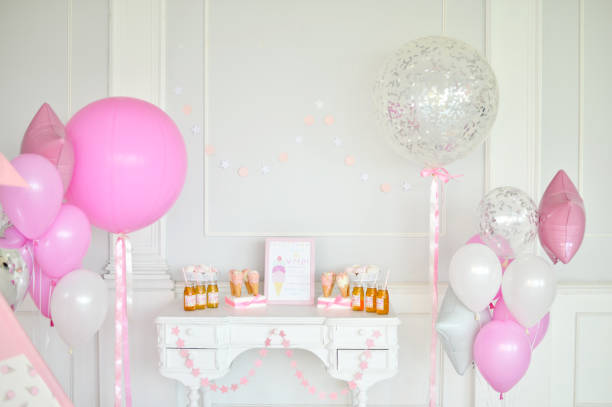istock Birthday decorations. Balloons pink and white. 1003383698
