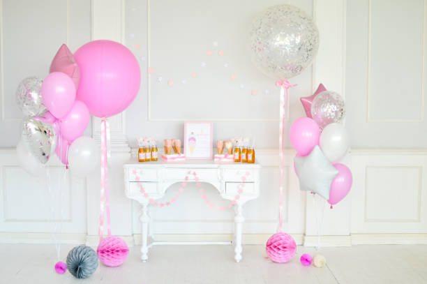 istock Birthday decorations. Balloons pink and white. 1003383794