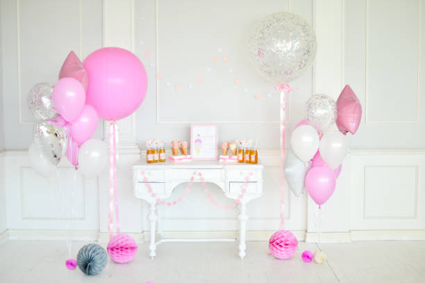 istock Birthday decorations. Balloons pink and white. 1003383806